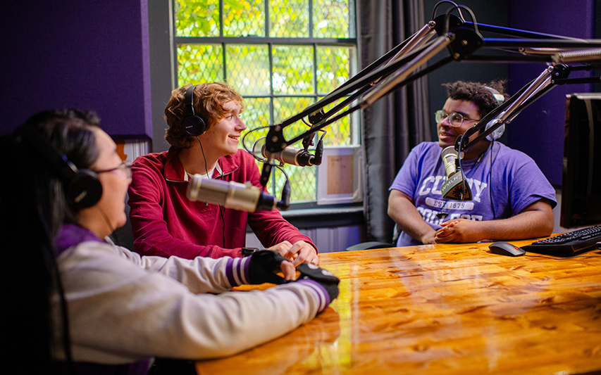 Students in the podcast studio of WMLN