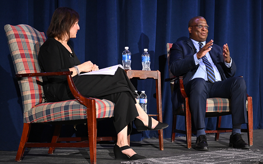 Commissioner Michael Cox sits down with Professor Jen Balboni during Social Justice Series event