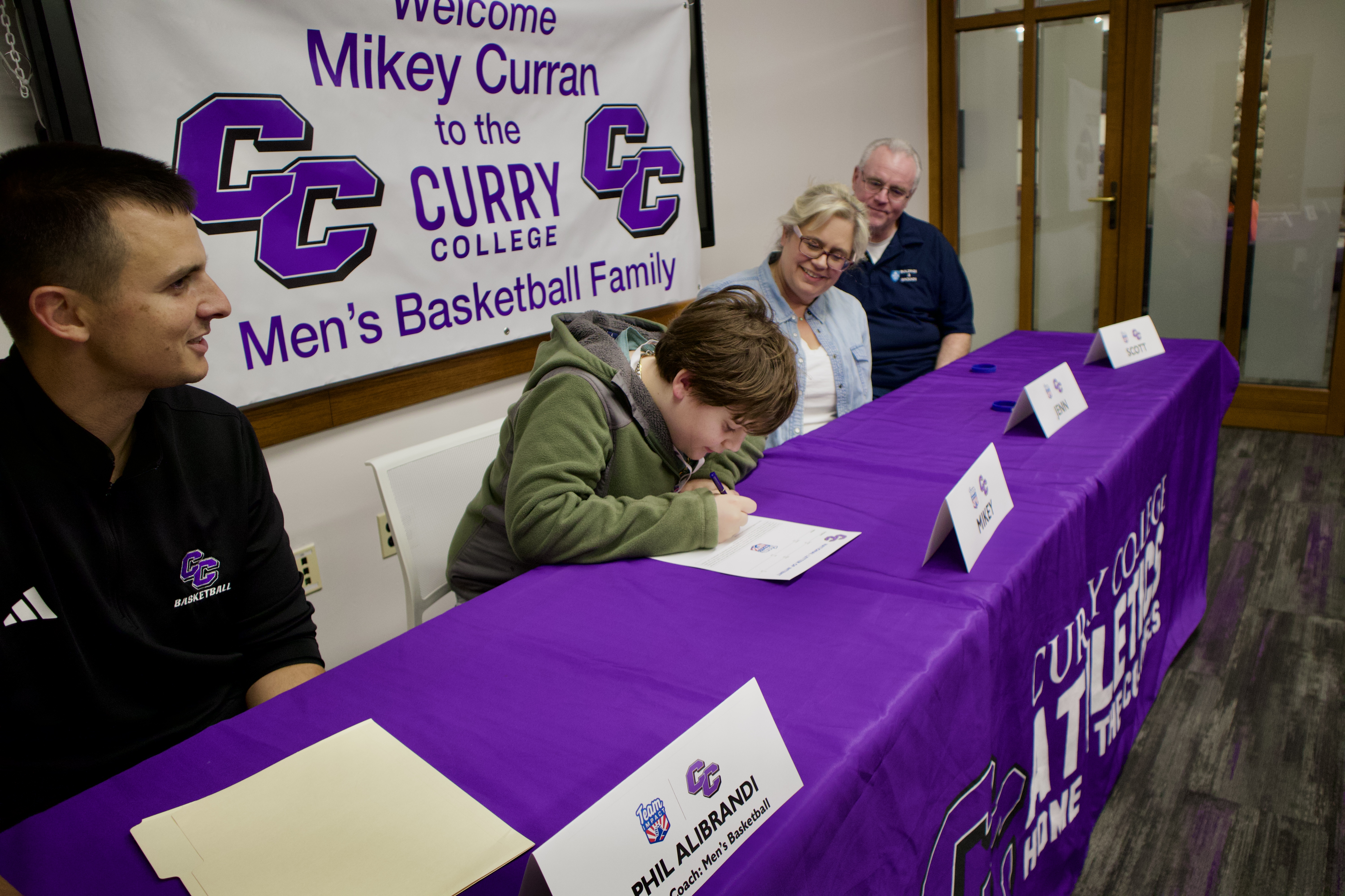 Mikey Curran Signs His Letter of Intent Through Team IMPACT