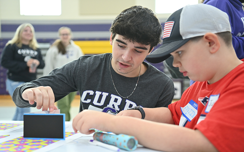 Curry Education Student Mentors Fifth Grader During STEAM Day 