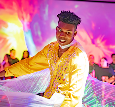 A student performs at a Curry College Music and Dance exhibition