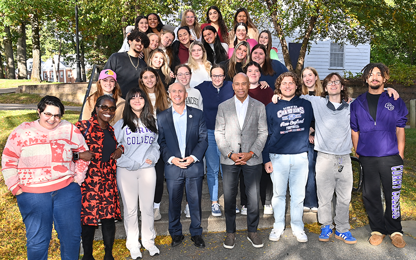 Former Governor Deval Patrick with President Jay Gonzalez and Curry PLP students