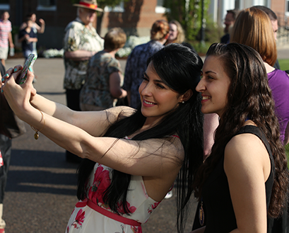 Students take a selfie on campus