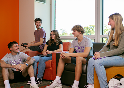 Curry College students hang out in Bell Hall