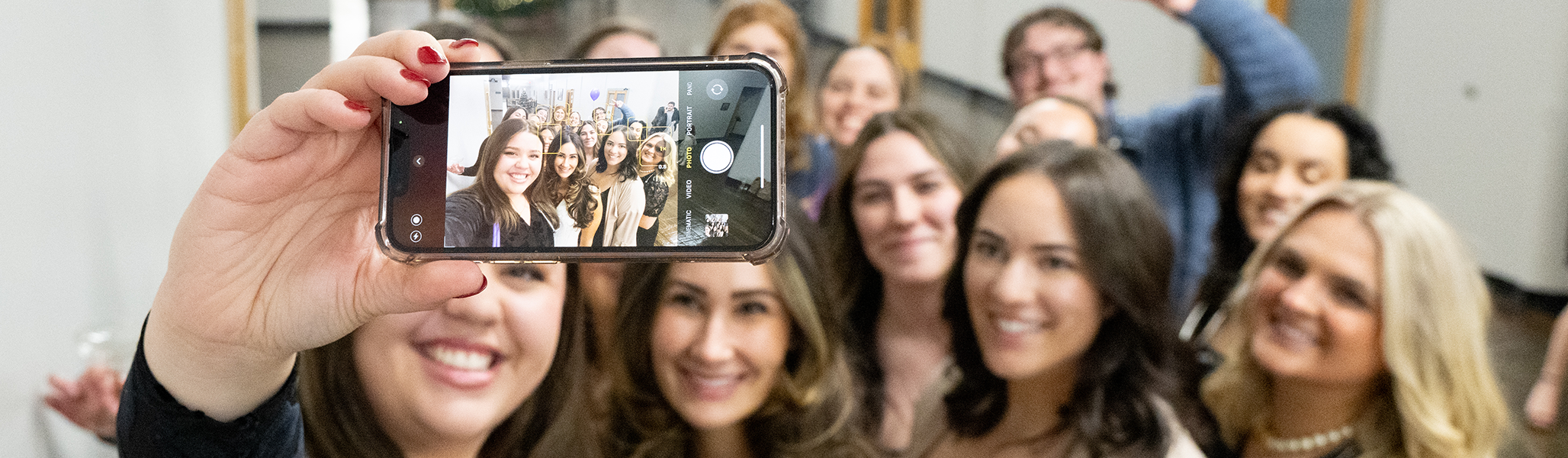 Curry College students at the Plymouth Campus pose for a photo