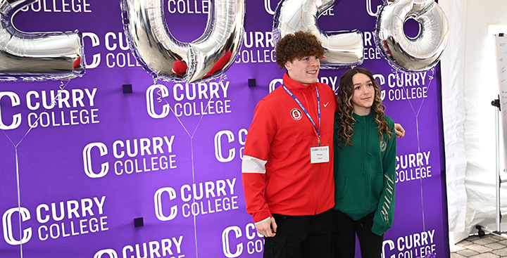 Student smiling for a photo at Curry College Accepted Student Day