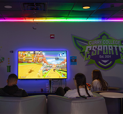 Curry students play video games in the Esports Lounge